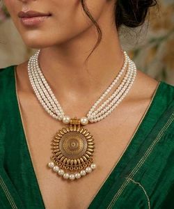 Elegant Pearl Necklace with Sun Pendant