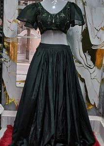 Elegant Green Lehenga Choli with Embellished Blous