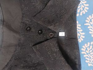 Textured black collar shrug