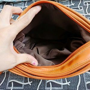 Orange Quilted Crossbody Bag