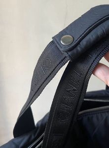 Chanel Black Quilted Duffle Bag