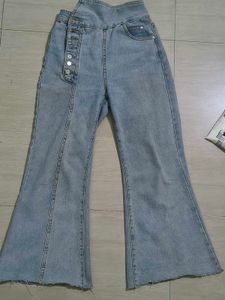 Light Wash Flared Jeans with Button Detail