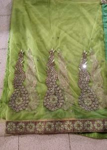 beautiful parrot green and pista sari with blouse