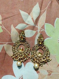 Exquisite Gold Jhumka Earrings with Pearls