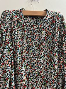 Marks and Spencer Floral Print Button-Up Tunic.