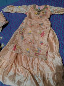 Peach Embroidered long Aline type frock