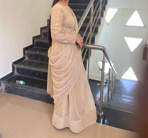 Elegant Beige Embellished Saree