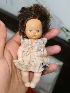 Vintage Doll with Brown Hair and Blue Eyes