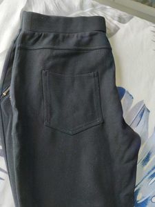 Chic Black Pants with Gold Zippers