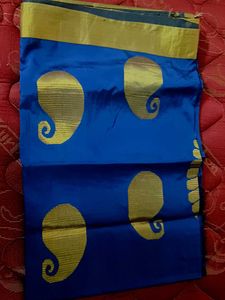 Vibrant Blue Saree with Golden Paisleys
