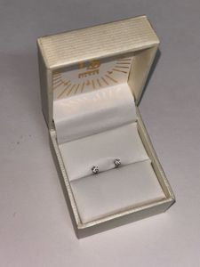 92.5% sterling sliver studs with certificate