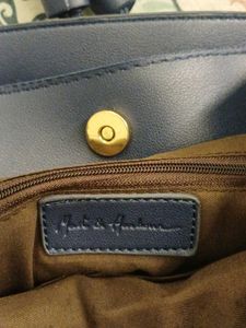 Blue leatherite backpack with magnetic shutters