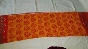 Vibrant Orange and Yellow Block Print saree