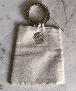 Cream Coloured Jacquard Wrist Pouch