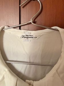 Elegant Cream Ruffled Blouse
