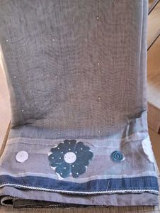 Elegant Grey Saree with Floral Embellishments