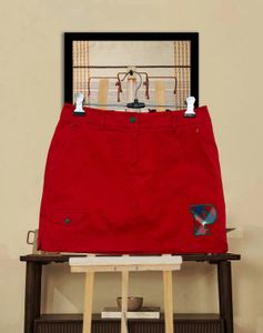 Red Mini Skirt with 'P' Emblem