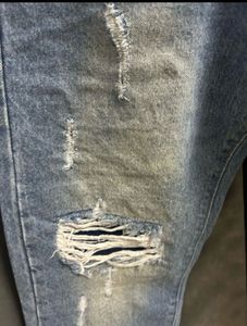 Supreme Distressed Blue Jeans