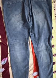 Distressed Blue Denim Jeans