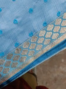 A Nice Sky Blue Saree With Beads