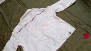 White Denim Jacket with Floral Trim