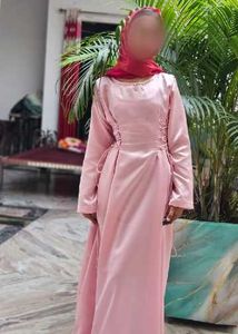 Elegant Pink Gown with Red Scarf