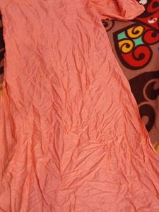 Elegant Peach Kurta with Embellished Neckline