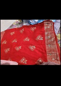 Red chiffon zari saree with stitched blouse