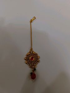 Gold Earrings With Mangtika In Red Stone