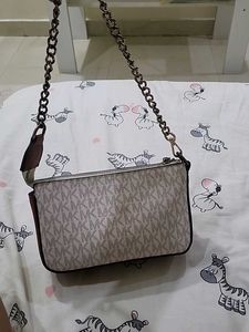 Michael Kors Monogram Clutch