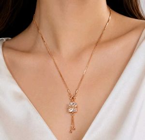Rose Gold-Tone Crystal Tassel Necklace
