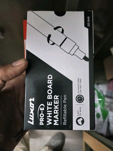 Logitech Mouse Pad , green pen and marker