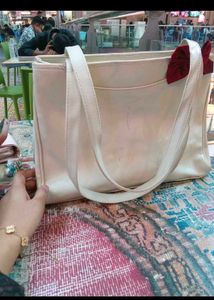 Chic Cream Tote Bag with Red Bow Accent