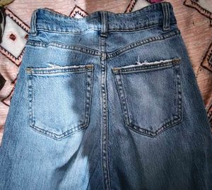 Distressed Light Wash Denim Jeans