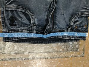 Distressed Blue Denim Jeans
