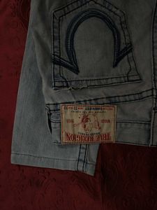 Light Wash Distressed Denim Jeans