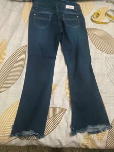 Blue Denim Flare Jeans with Frayed Hem