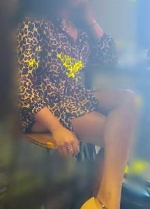 Printed mini dress with waist tie up