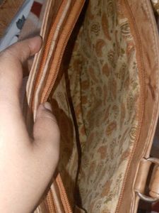 Stylish Tan Shoulder Bag with Scarf Accent