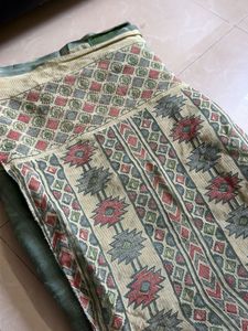 Elegant Green Saree with Geometric Border