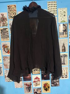 Women's Black Ruffle Front Top