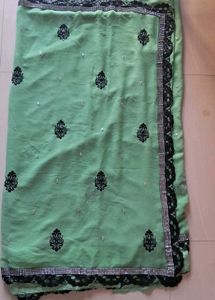 Elegant Sea Green Saree with Black Embellishments