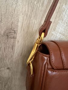 Stylish Brown Shoulder Bag with Gold Chain Detail