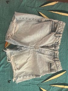 light washed distressed denim shorts