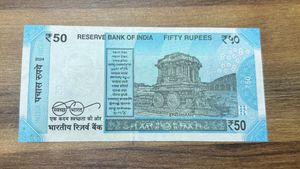 Rare 50 Rupees tripling serial number