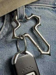 crooked crucifix carabiner