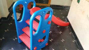 Bright Red Plastic Slide