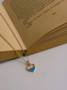 Gold Heart Necklace with Blue Accent