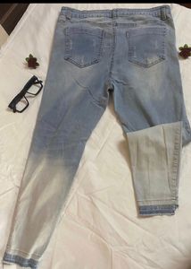 Distressed Light Wash Denim Jeans