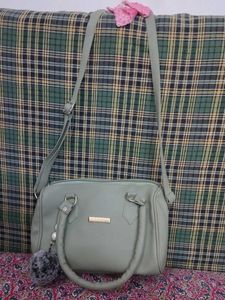 Stylish Light Green Handbag with Charm